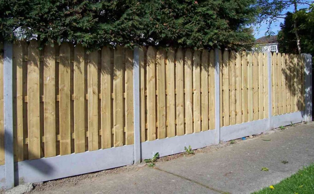 Local fence expert installing wooden garden fence in Dublin